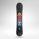 Soulside- Black snowboard with a multicolored floral pattern in the center on a white background