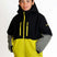 SquallKidsInsulatedJacket-A child wearing a hooded ski jacket with a black upper section, bright yellow lower section and zipper details, and gray sleeves, photographed against a plain white studio background.