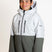 SquallKidsInsulatedJacket-A young boy wearing a color-blocked ski jacket in white and gray, with matching gray pants, photographed against a clean white studio background.