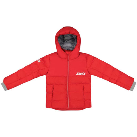TeamKidsDownJacket- A red puffer jacket with a hood, featuring a white 'swix' logo on the left chest and a white star logo on the right sleeve, displayed flat against a white background.