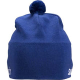 TraditionBeanie-A royal blue knit beanie hat with a white embroidered 'Swix' logo on the front and a matching blue pom-pom on top, shown against a plain white background.