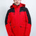 TritonMensInsulatedJacket-A man wearing a red and black Karbon hooded jacket, standing against a light gray studio background.