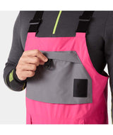 UllrDBibShellPant- Pink bib overalls with black accents on a white background