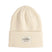 UniformBeanie- Off white beanie with a brand label on a white background