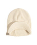 UniformBrimBeanie- Off white beanie with a brand label on a white background