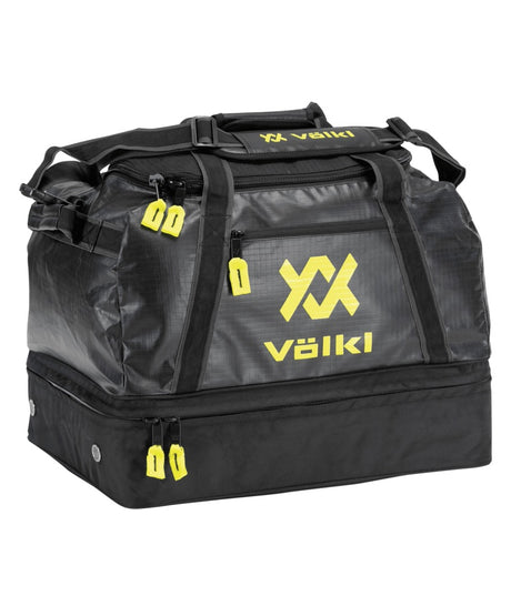 VolklOverUnderWeekendBag- A black Volkl sports duffel bag with bright yellow logo and zipper pull accents, shown on a plain white background.