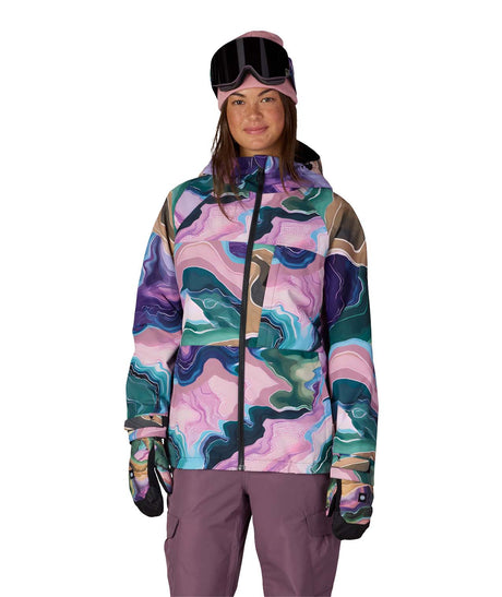 WAthenaInsulatedJacket-Person wearing a colorful camouflage jacket and pink goggles on a white background