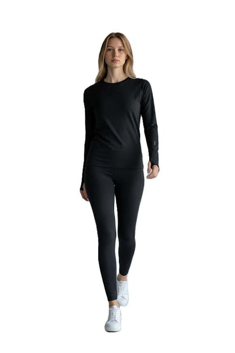 WBaselayer-Woman wearing a black long-sleeve top and leggings on a white background