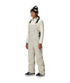 WBlackMagicInsulatedBib-Person wearing a white snowsuit and black beanie on a white background