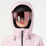 WBrilliant2.0InsulatedJacket-Person wearing a pink hooded jacket and black helmet with reflective goggles on a white background