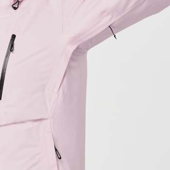WBrilliant2.0InsulatedJacket-Close-up of a light pink jacket with zippers on a white background