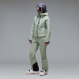 WCanopyInsulatedJacket-A light sage green hooded jacket with black zipper and drawstring details, displayed on a neutral gray background. The Oakley logo is visible on the left chest.