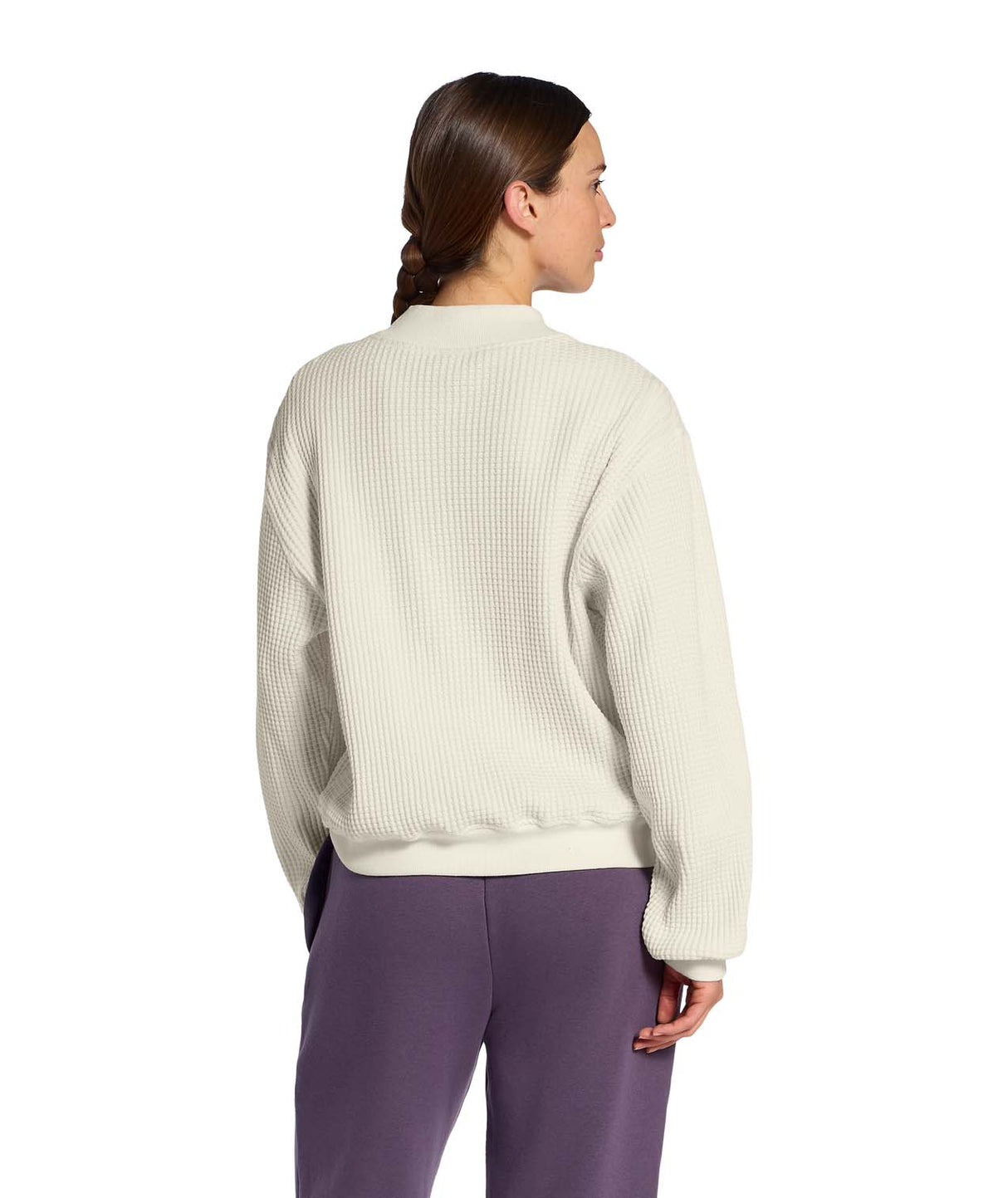 WChabot2.0MockNeck-Woman wearing a beige ribbed mock-neck sweater on a white background