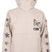 WChromaJacket- Cream jacket with flowers down both sleeves and a butterfly on the top left shoulder on a white background