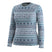 WClassicThermalMerinoBaseLayerCrew- A women's long-sleeve crewneck sweater featuring a horizontal Nordic and Fair Isle style pattern in slate blue, teal, and white.
