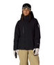 WGore-texWillowInsulatedJacket-Person wearing a black snow jacket, beige pants, and white gloves on a white background