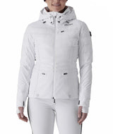 WGranadaJacket- Woman wearing a white jacket on a white background