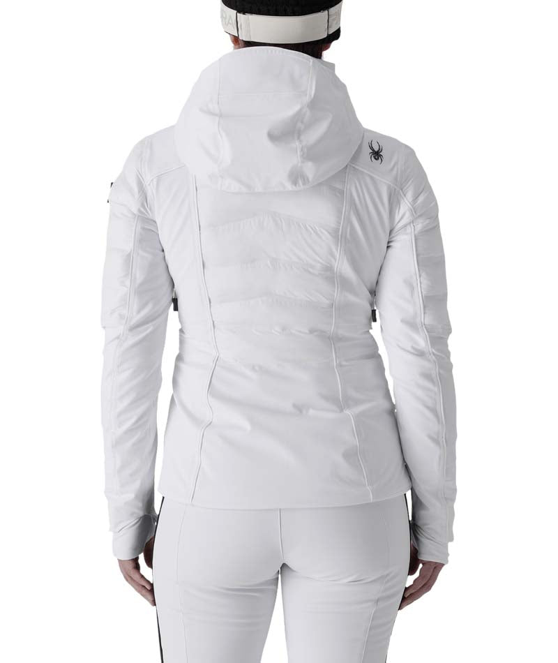 WGranadaJacket- Woman wearing a white jacket on a white background