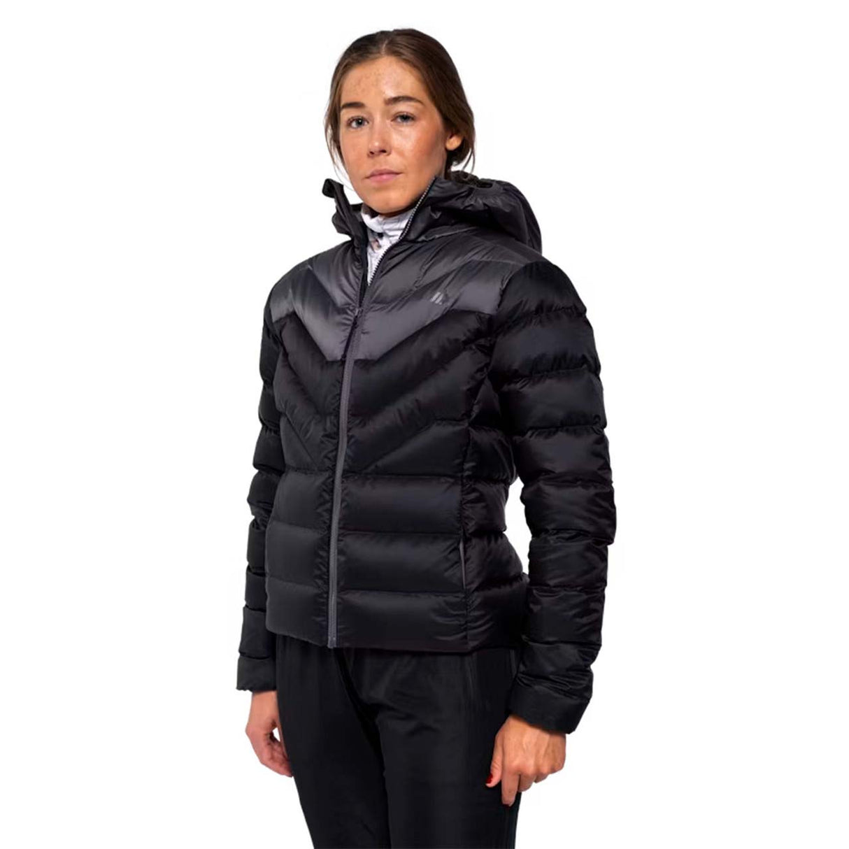WInfinityDownJacket- A black hooded puffer jacket with a gray chevron pattern on the upper chest and shoulders, shown against a plain white background.