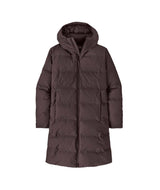 WJacksonGlacierParka-A dark brown hooded puffer coat with horizontal quilting, shown against a plain white background.