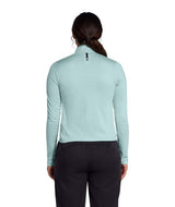 WJaida1_4Zip- Woman wearing a light blue long-sleeve quarter zip shirt on a white background
