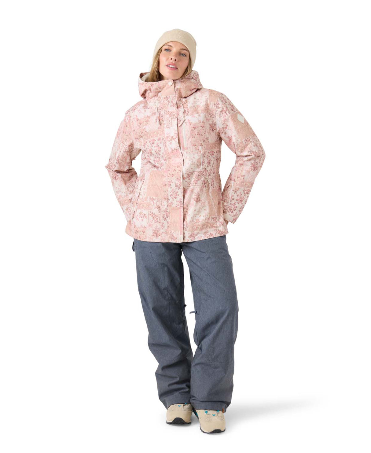 WJetty3-in-1Jacket- Woman wearing a pink jacket with a floral pattern on a white background