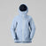 WLofotenGore-TexJkt-Person wearing a light blue jacket and pants on a gray background