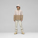 WLofotenGore-TexJkt-Person wearing a two-tone jacket and pants on a gray background