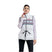 WMayenQuiltedPolyfillVest- A woman modeling a white sleeveless zip-front puffer vest with a colorful geometric pattern across the chest, black drawstring waist, and a red inner collar, worn over a light purple long-sleeve top and black pants against a white background.