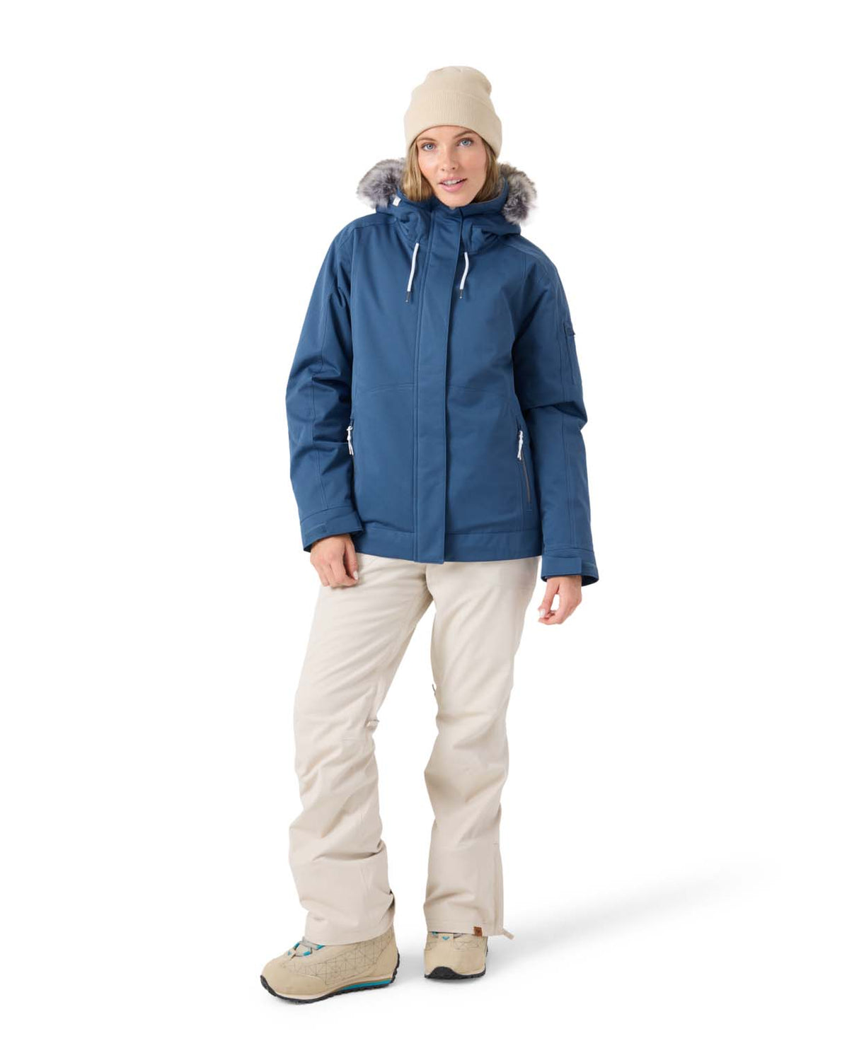 WMeadeJacket- Woman wearing a blue jacket on a white background