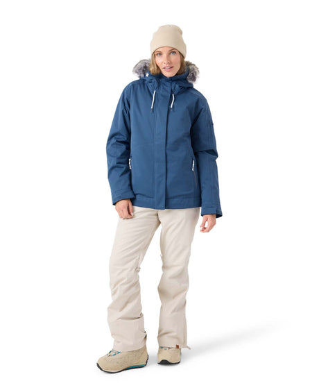 WMeadeJacket- Woman wearing a blue jacket on a white background