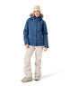 WMeadeJacket- Woman wearing a blue jacket on a white background