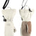 WMontanaMitt-Pair of white and brown mittens with a strap on a white background