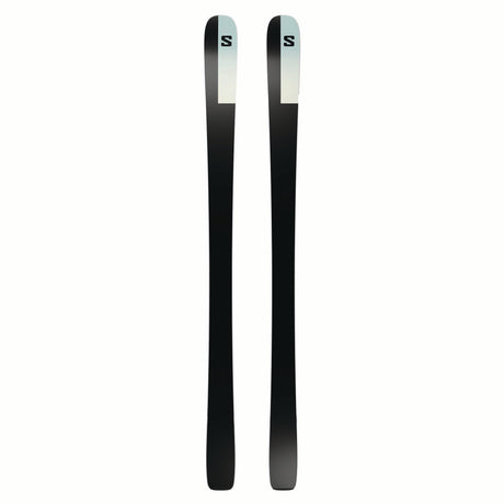 WNSTANCEPRO82-Pair of black skis with green tips on a white background