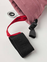WPatrolGauntletGlove-Pair of pink and white gloves with a visible brand logo on a white background