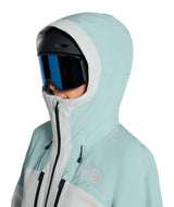 WPowstarJacket-Person wearing a light blue jacket with The North Face logo on a white background