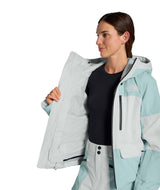 WPowstarJacket-Person wearing a light blue jacket with The North Face logo on a white background