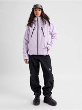 WReserveGORE-TEX2LInsulatedJacket-Person wearing a light purple jacket and black pants on a white background