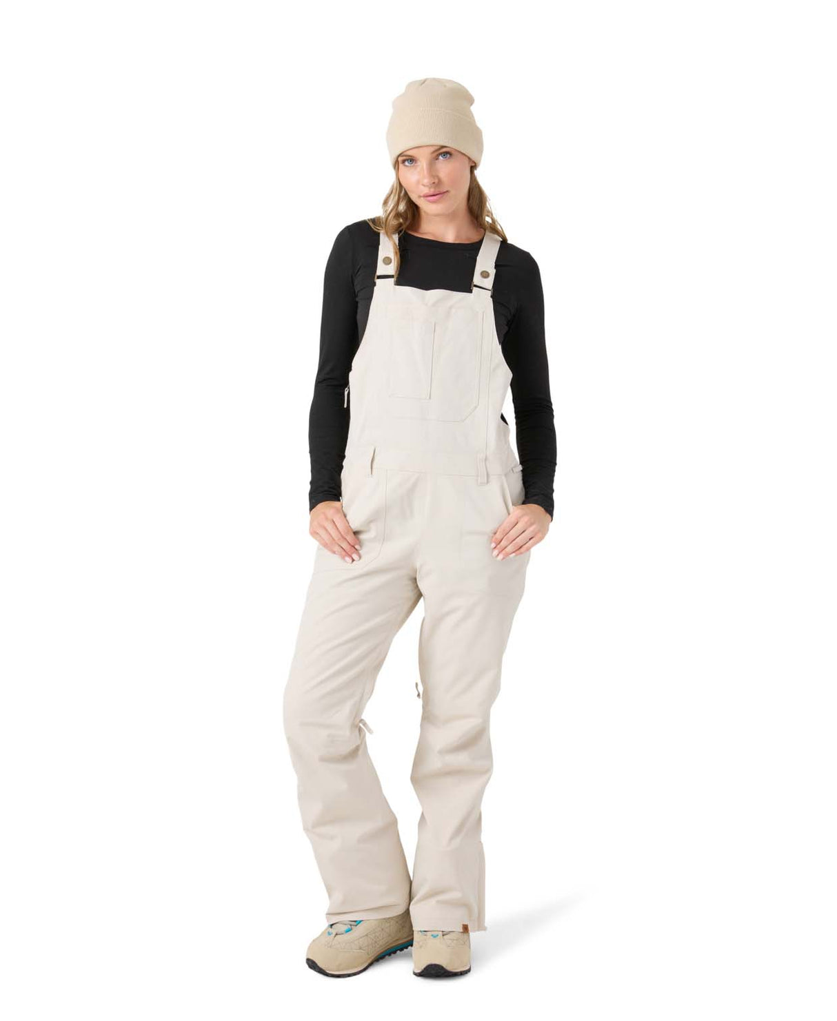 WRideoutBib- Woman wearing cream bibs on a white background