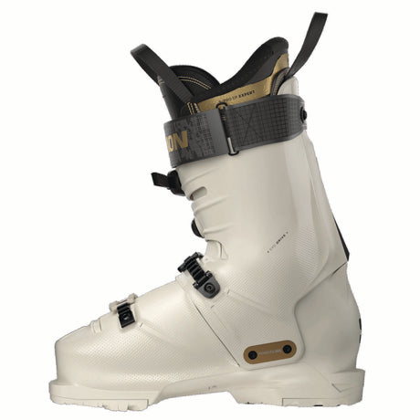 WSPROALPHACBOA105- White ski boot with black and gold accents on a white background