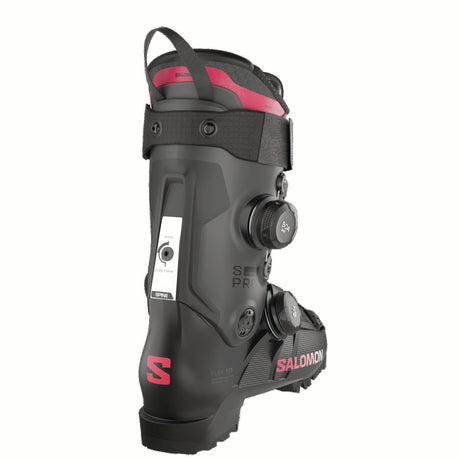 WSPROSUPRADUALBOA115- Black Salomon ski boot with pink accents on a white background