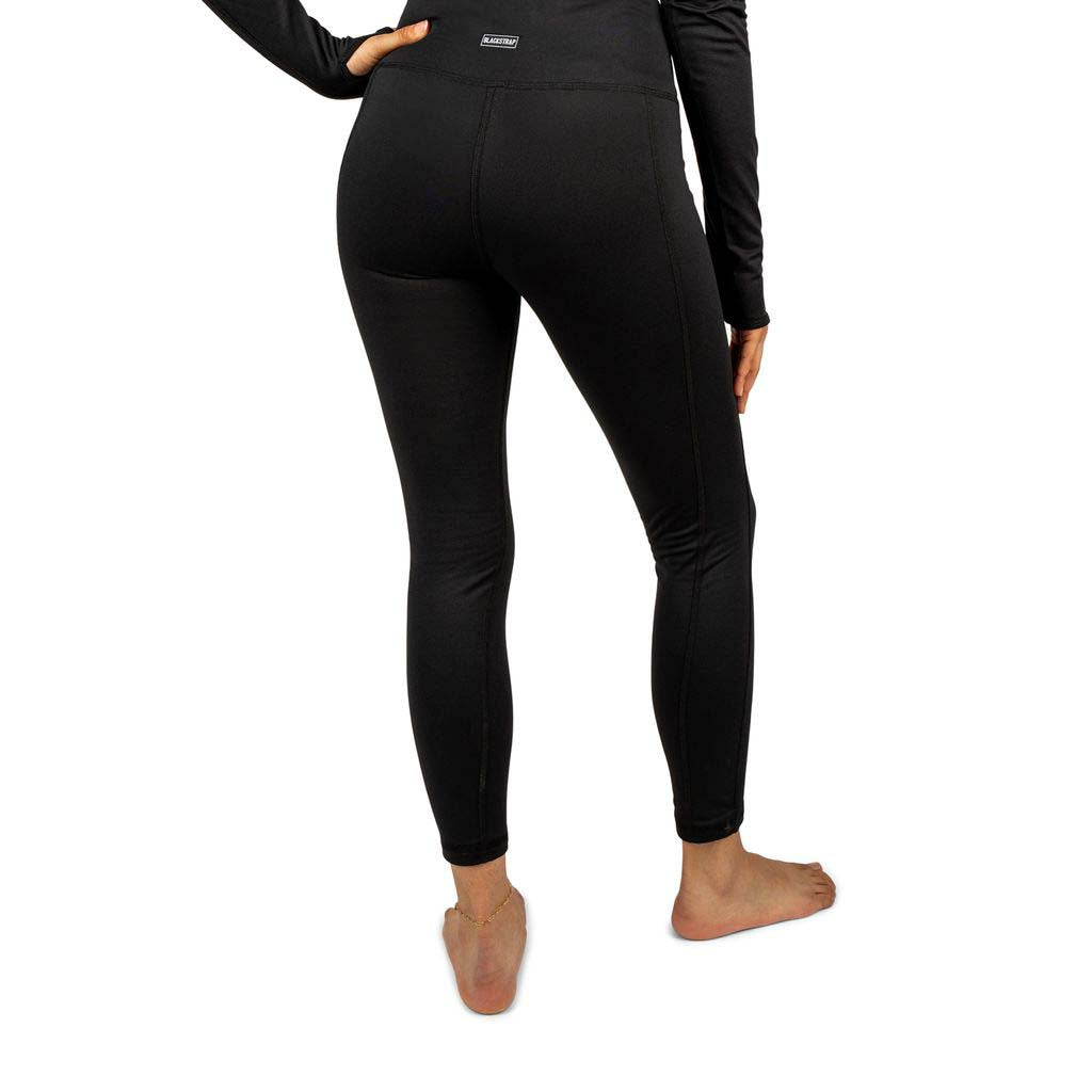 WSkylinerPant-Person wearing black leggings on a white background
