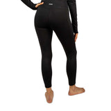 WSkylinerPant-Person wearing black leggings on a white background