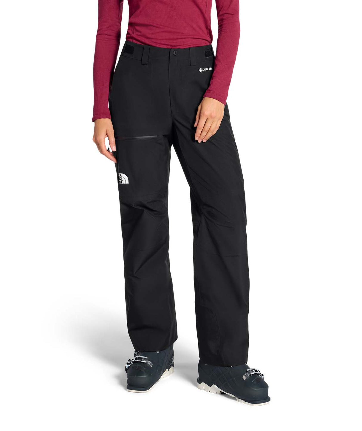 WSummitEastwallGTXPant-Person wearing black pants with a brand logo on a white background