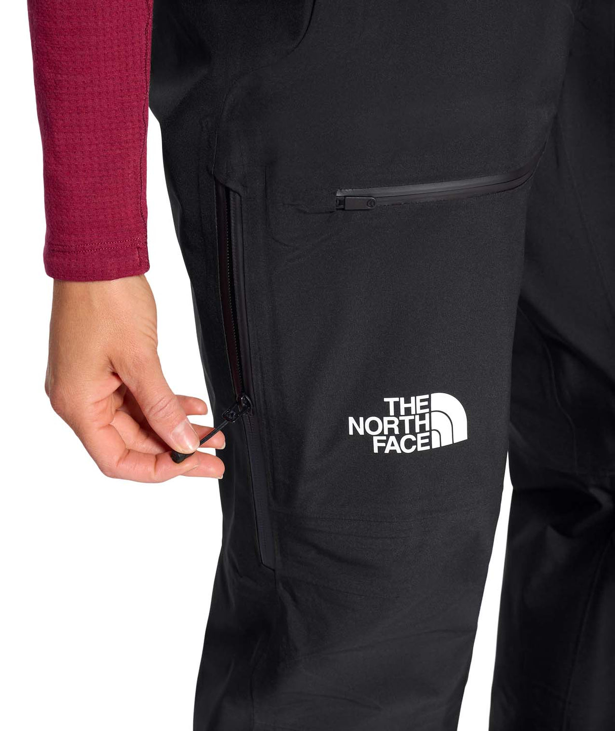 WSummitEastwallGTXPant-Black pants with The North Face logo on a white background