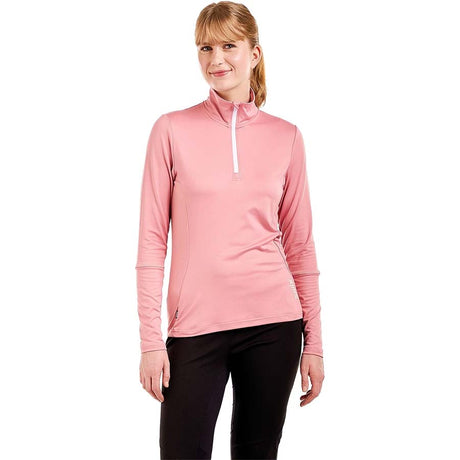 WTista1_2ZipMidlayer- A woman modeling a pink long-sleeve half-zip athletic top with a white zipper pull, paired with black leggings, against a plain white background.