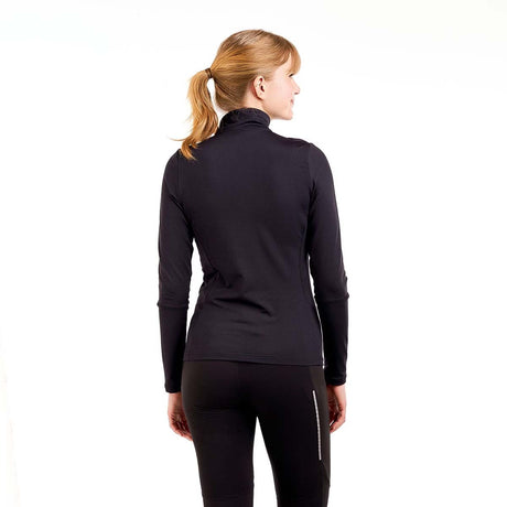 WTista1_2ZipMidlayer- A woman modeling a black long-sleeve half-zip athletic top with a white zipper pull, paired with black leggings, against a plain white background.