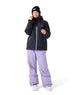 WZephyrJacket- Woman wearing a black jacket with light purple zippers on a white background
