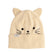 Wildlings-Beige cat-themed beanie with ears and facial features on a white background