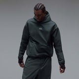 WintertideScratchedHoodie-A dark charcoal gray hooded sweatshirt with a small white Oakley logo on the left chest, displayed against a neutral gray gradient background.